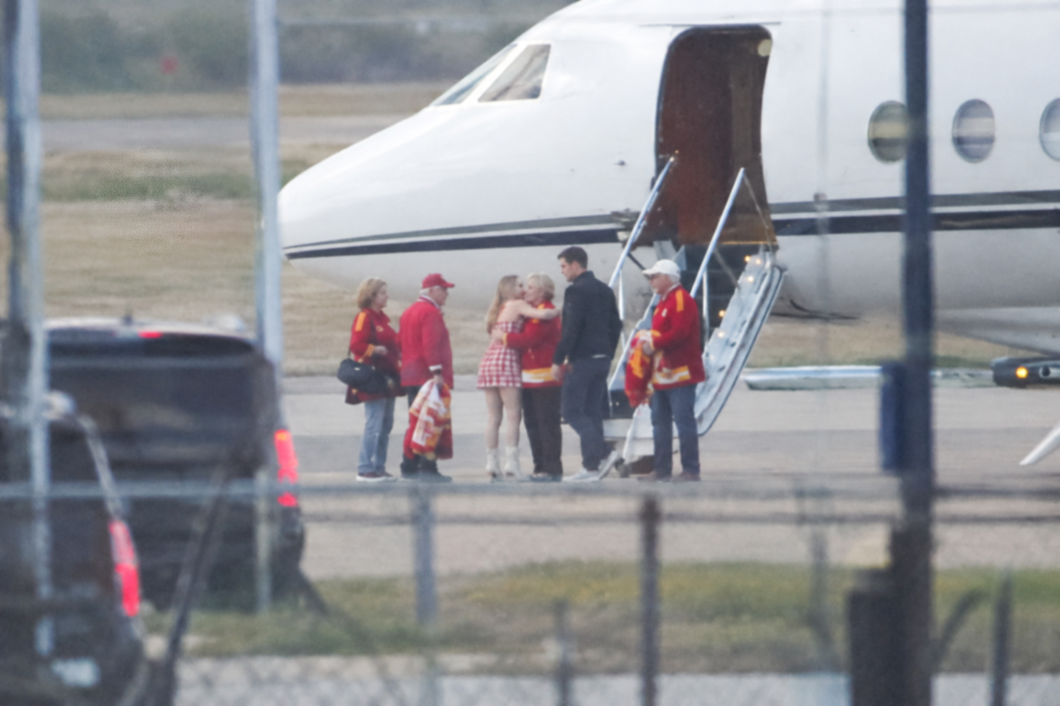First Glimpse at the Sweetest Moment as Taylor Swift Arrives in Kansas City on Her Private Jet Alongside Her Parents, Andrea and Scott Swift, and Her Husband Travis Kelce’s Parents, Donna and Ed Kelce, to Show Their Support for Travis at the Chiefs vs. Colts Game - Both Sets of Parents Wear Identical Outfits as a Sweet Nod to Travis, While Taylor Shares Heartwarming Hugs With Her Mom and Donna and the Fathers Hold Special Items to Cheer Travis Kelce That Fans Can’t Stop Talking About... See Clearer Photos and the Never-Before-Seen Clip of Their Beautiful Arrival