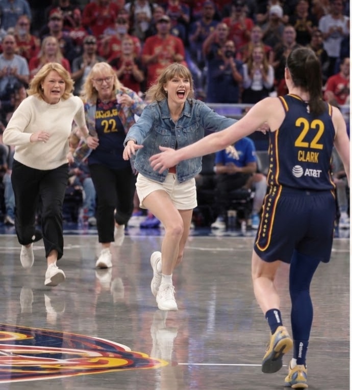 Taylor Swift Breaks WNBA Protocol and Runs Onto the Court to Celebrate With Caitlin Clark, Gives Her a Huge Hug and Points at the No. 22 on Her Back After Fever’s Thrilling 96-77 Win Over the Lynx - Mom Andrea Swift and Donna Kelce Are Seen Chasing After Her to Caution Her as an Overexcited Taylor Couldn’t Hold Herself Back... See the Full Never-Before-Seen Clip and Photos