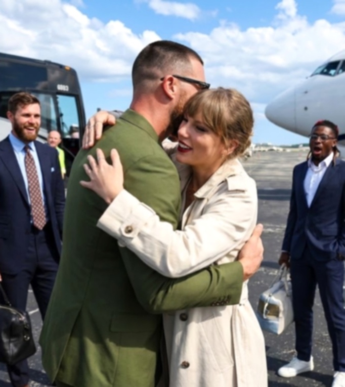 Taylor Swift Breaks Airport Protocol and Runs to Welcome and Hug Husband Travis Kelce as He Arrives in Florida With His Chiefs Teammates Ahead of the Chiefs vs. Dolphins Game in New Photos