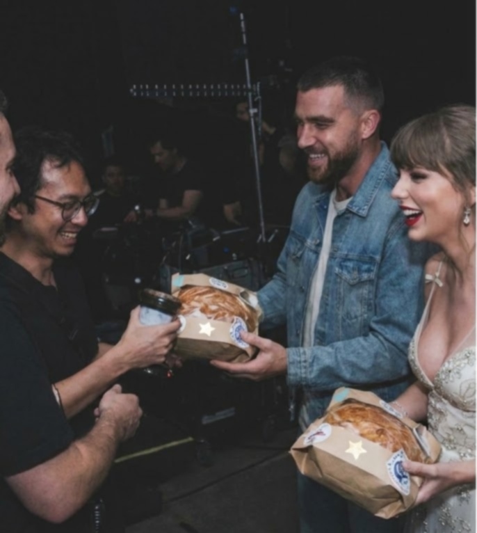 Travis Kelce Steals the Spotlight Behind the Scenes of Wife Taylor Swift’s “Patient Zero” Video, Helping Her Distribute the Homemade Sourdough Bread She Made for the Film Crew