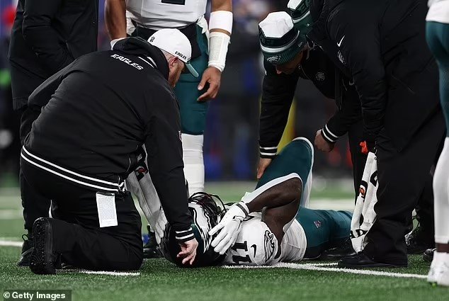 Philadelphia Eagles suffer double injury scare vs Giants as QB Jalen Hurts' finger appears to POP OUT after A.J. Brown limped from the field with a knee injury