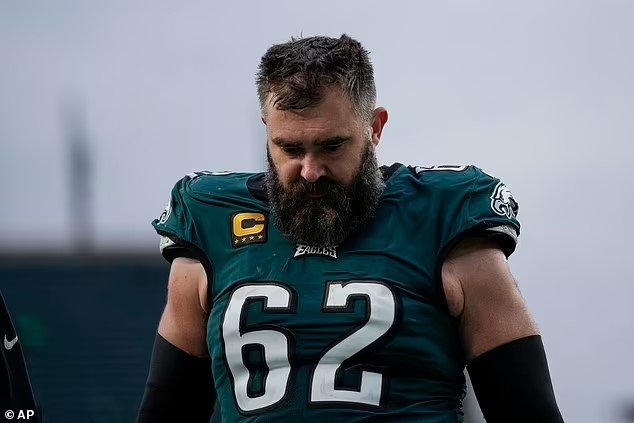 Jason Kelce reveals the tracksuit he wore on New Year's Eve was the gift brother Travis bought him and all his Chiefs teammates...