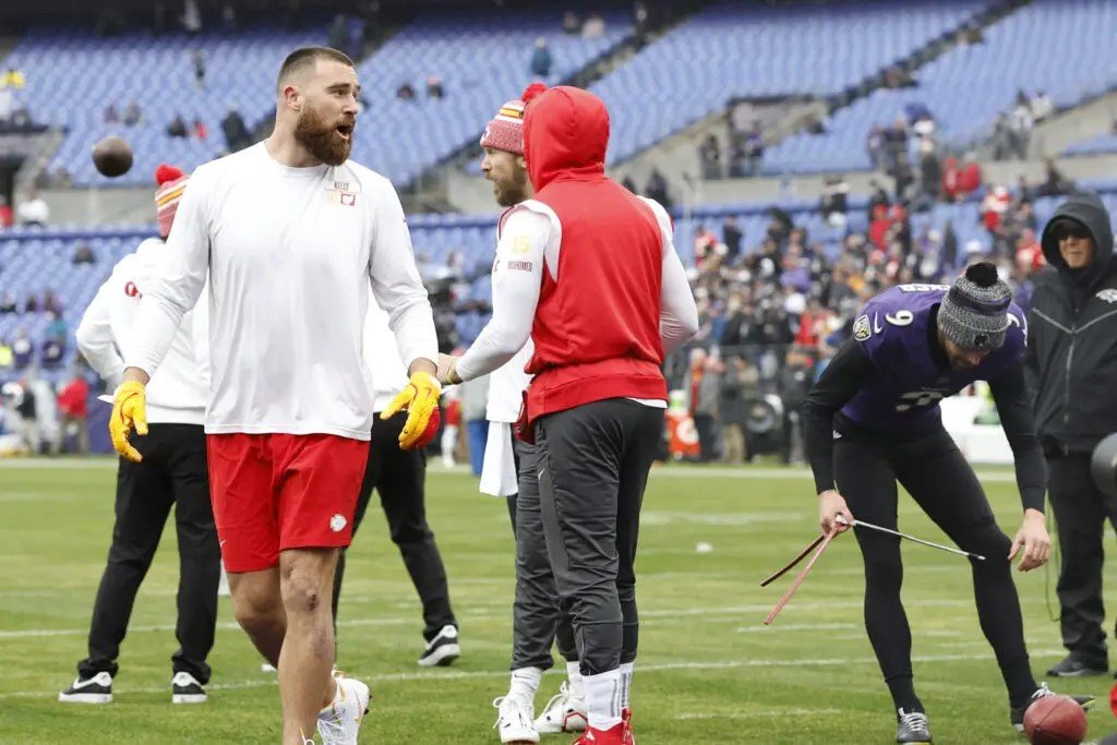 Travis Kelce THROWS Ravens rival Justin Tucker's helmet and tells the kicker to move as he was in the way of Chiefs quarterback Patrick Mahomes warming up