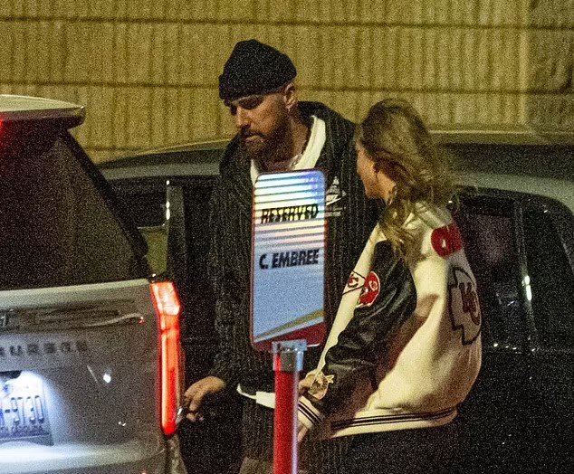 Taylor Swift and Travis Kelce drive around in a Rolls-Royce after their passionate New Year's Eve kiss