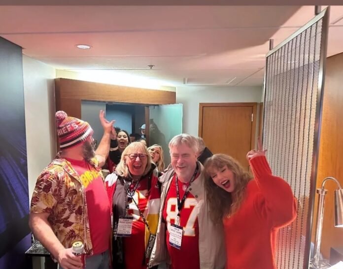 Taylor swift looks happy being a part of the Kelce family, you can tell by the smiles on their faces