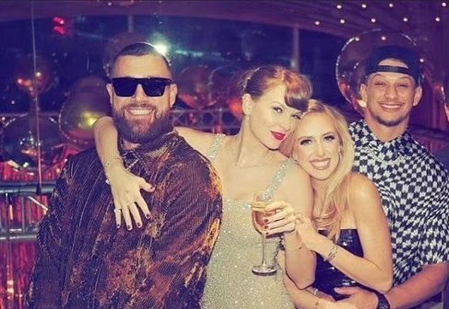 Taylor Swift wraps a loving arm around Travis Kelce as they pose with Brittany and Patrick Mahomes in new snap from NYE bash