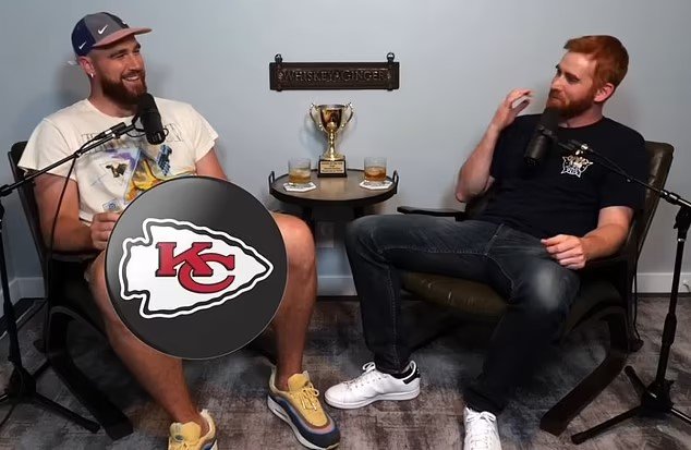 Travis Kelce is left in hysterics over story about him 'falling out of his shorts' on podcast appearance... with host Andrew Santino forced to cover up NFL star's crotch with a Chiefs logo to protect his modesty on YouTube!