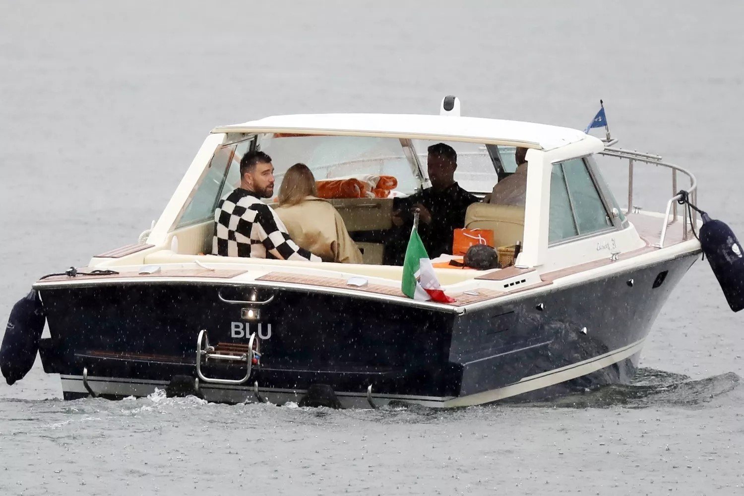 Taylor Swift and Travis Kelce Share a Kiss on Romantic Boat Ride in ...