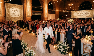 First Glimpse of the Moment Travis Kelce and Taylor Swift Stun in Pure White as They Walk Into MSG Hall for Their Wedding Rehearsal Dinner and Receive a Standing Ovation from Family, Friends, and A-List Celebrities... See Never-Before-Seen Photo