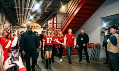 Taylor Swift, Alongside Her Parents Andrea and Scott Swift and Her Husband Travis Kelce’s Parents Donna and Ed Kelce, Arrive in Grand Style at Arrowhead Stadium to Support Travis at the Chiefs vs. Broncos Home Season Opener, With Both Sets of Parents Wearing Identical Outfits and Bringing the Sweetest Nod to Travis That Could Bring Him to Happy Tears - And Fans Can’t Stop Talking About It... See Clearer Photos and the Never-Before-Seen Clip of Their Beautiful Arrival
