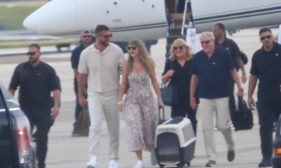 Travis Kelce and Wife Taylor Swift Arrive in Florida With Her Parents Andrea and Scott Swift on Taylor’s Private Jet in New Photos Ahead of the Chiefs vs. Dolphins Game, But a New Photo of Taylor Carrying a Custom Travel Carrier for Their New Samoyed, Wendy, Has Fans Asking the Same Question: Will She Break NFL and Stadium Protocol and Bring Their Pet to the Game?