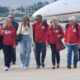 Taylor Swift, Alongside Her Parents Andrea and Scott Swift and Her Husband Travis Kelce’s Parents Donna and Ed Kelce, Arrives in Miami, Florida, on Taylor’s Private Jet to Show Their Support for Travis at the Chiefs vs. Dolphins Game, With Both Sets of Parents Wearing Identical Outfits and Holding Something So Sweet to Cheer for Travis Together for the Chiefs’ Third Win That Fans Can’t Stop Talking About... See Clearer Photos and the Never-Before-Seen Clip of Their Beautiful Arrival