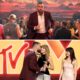 Travis Kelce Steals the Spotlight Again at the VMAs as He Runs to the Stage While Taylor Swift and Dakota Johnson Walk Off, Shouting “Mr. Cleveland Is Coming!” Before Giving His Wife a Sweet Celebratory Hug and Kiss After She Receives the MTV VMA Artist Directors Honors