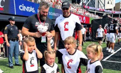 Taylor Swift Goes Full "Aunt Mode" as She Adorably Chases and Teaches Silly Cheers to Jason Kelce’s Three Daughters Wyatt, Elliotte, and Bennett on the Turf at the Bearcats' Opening Game Next to Travis Kelce Ahead of Jason’s Big Hall of Fame Honor... See the Full Adorable Clip